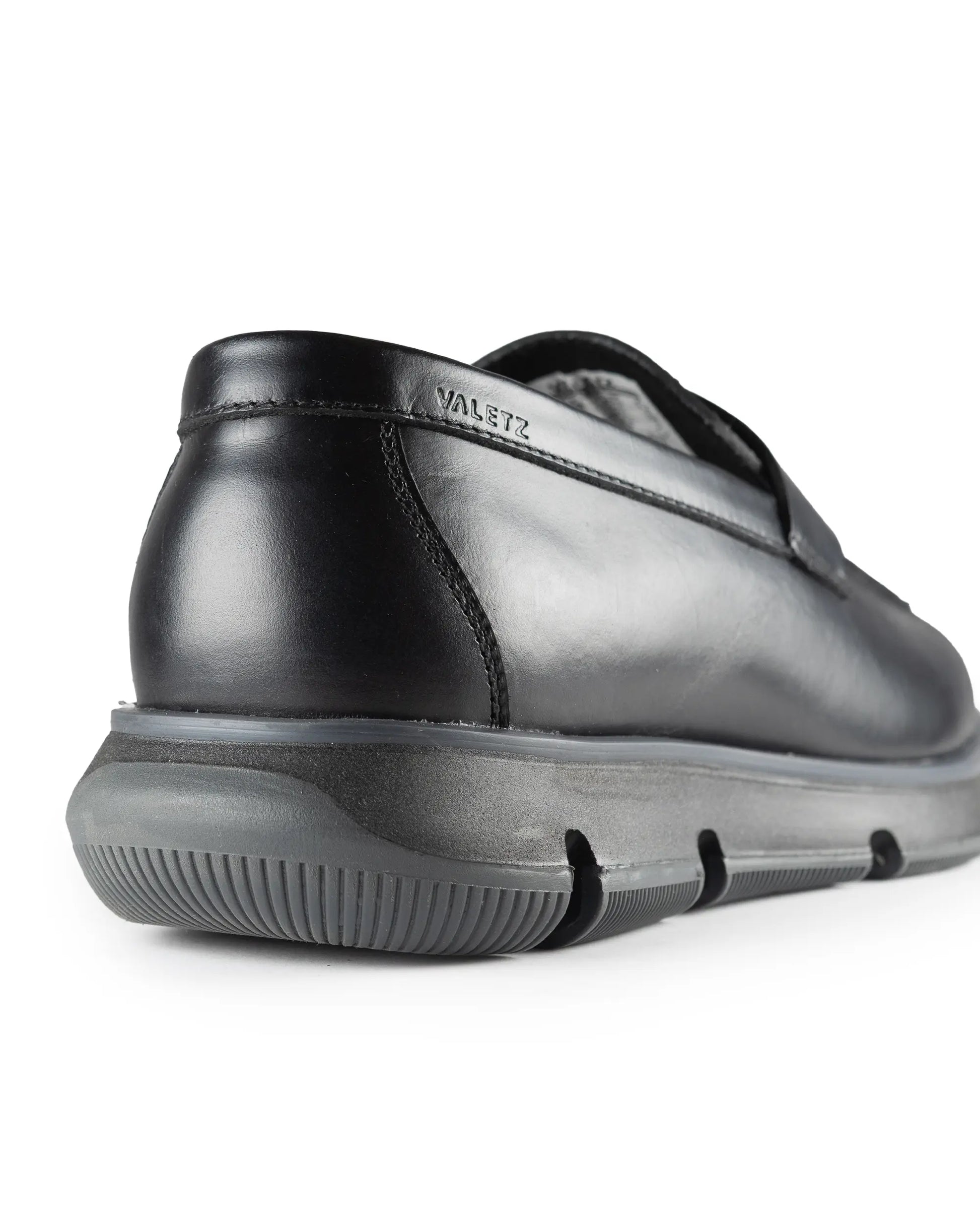 Olmo Estilo Penny Loafer Negro - detalle costura cuero premium hecho a mano