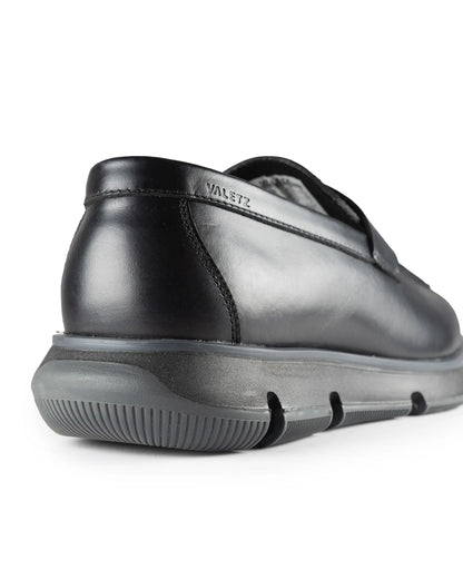 Olmo Estilo Penny Loafer Negro - detalle costura cuero premium hecho a mano