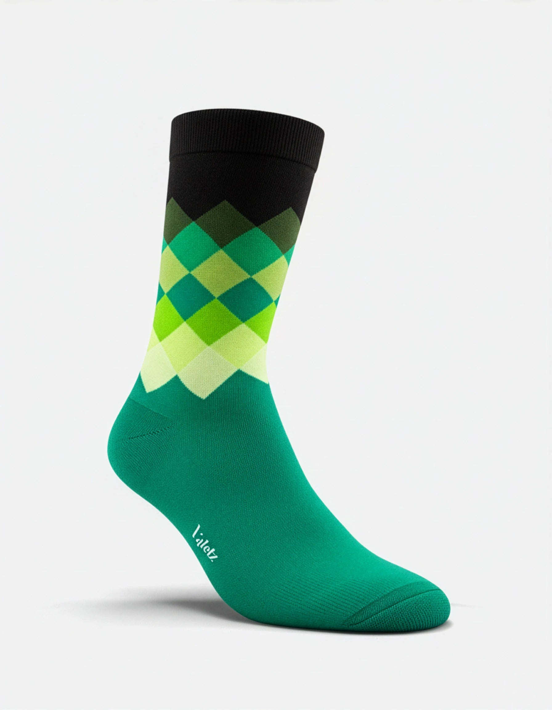 Par de calcetines de algodón unisex de color negro con vibrantes detalles en verde multicolor sobre una superficie blanca.