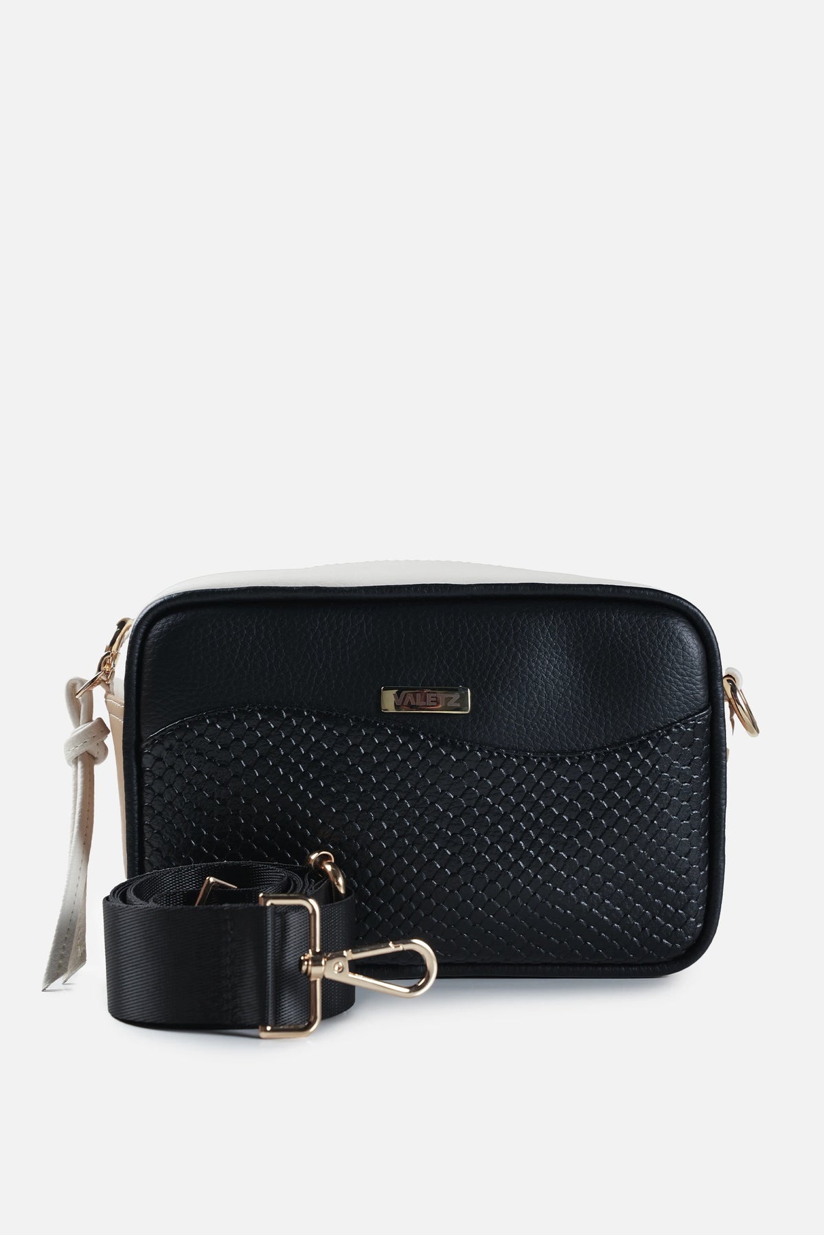 Mini bag de cuero para mujer color tapue modelo Grecia con manija corta y correa larga.