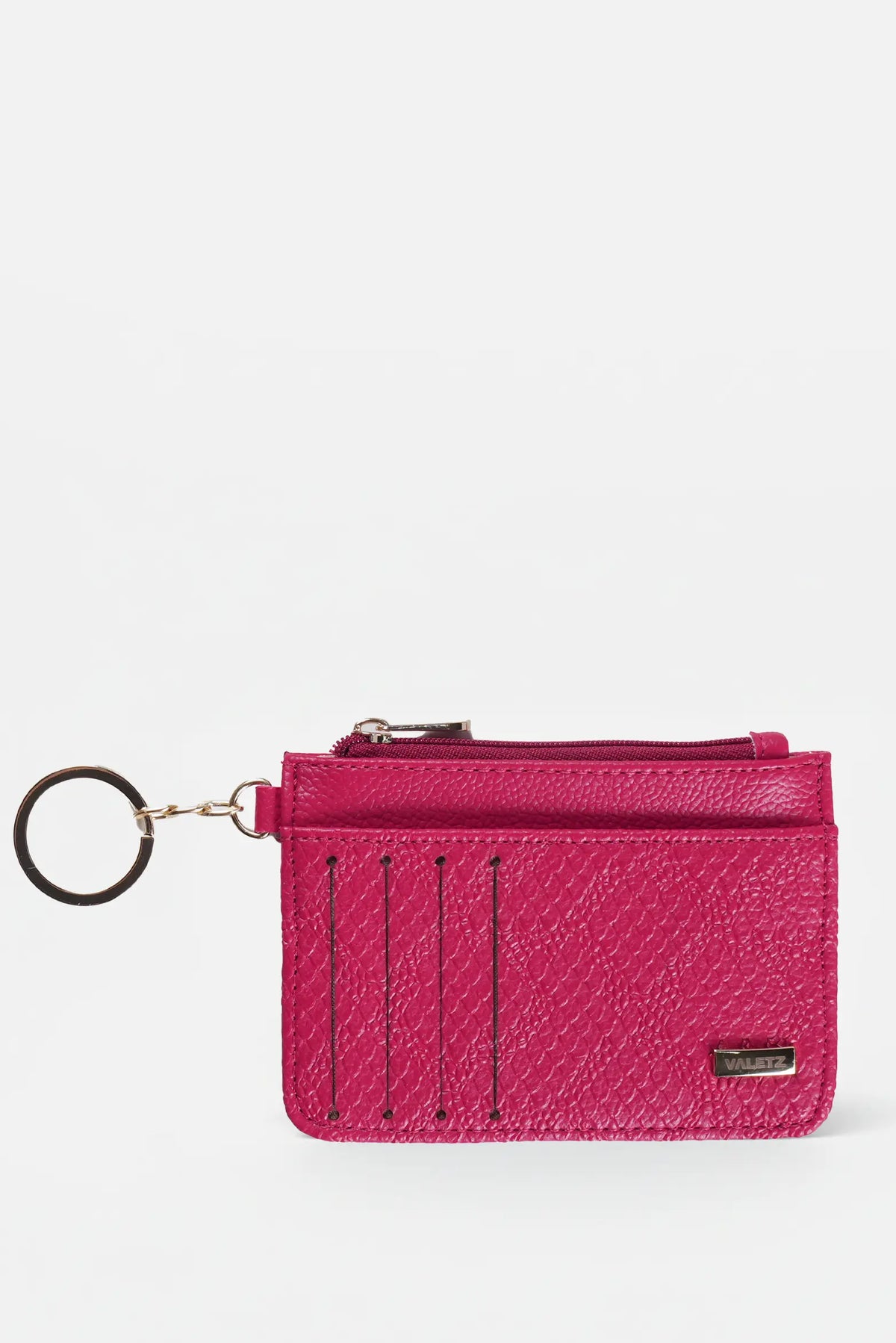 Billetera de cuero para mujer color rojo modelo Lucia, vista frontal con cierre y llavero.